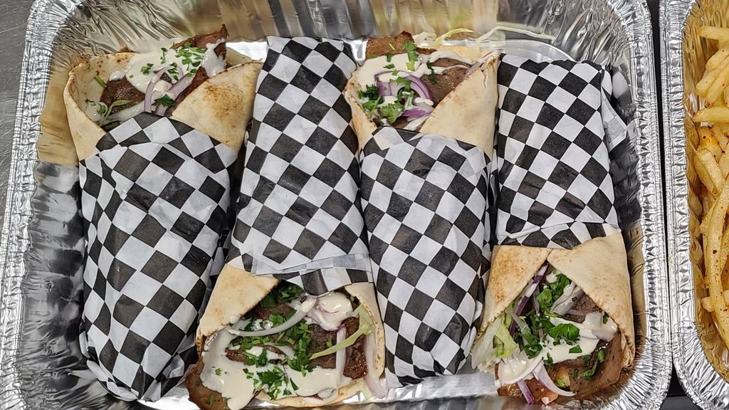 Group Of 4 Combo Wrap · Choice of 4 combo wraps. Come with Fries and soda.
