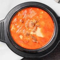Soft Tofu Soup With Beef (고기순두부) · Soft tofu soup with beef. (Includes 1 serving of white rice and seasonal side dishes per ord...