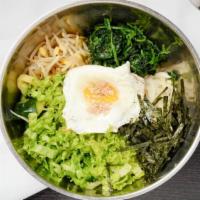 Bibimbap (비빔밥) · Steamed rice with assorted vegetables.  (Includes seasonal side dishes per order)