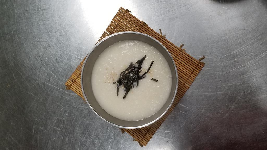 Abalone Rice Porridge (전복죽) · Shdedded abalone and rice porridge. (Includes seasonal side dishes per order)