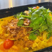 Curry Noodle Gai · Egg noodle, topped with chicken yellow curry broth, garnish with fried shallot and cilantro.