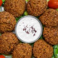 Falafel Plate (6 Ct.) · six pices of falafel comes with tahini sauce & pita bread