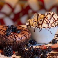 Chocolate Lava Cake · Ghirardelli Chocolate Cake, Berries, Vanilla Ice Cream.