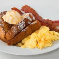 French Toast Combo · Served with 3 eggs and choice of bacon or sausage.