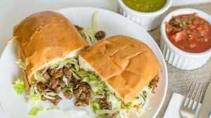Machaca Torta · Meat (shredded beef and premix bell peppers) , lettuce, pico de gallo and guacamole