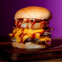 Wild West Bbq Burger · Double 4 oz. Beef Patties, 2 slices of American Cheese, Classic Sauce, BBQ Sauce, Pickles, B...