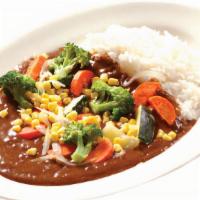 Vegetable Curry · Curry sauce with vegetables served with rice. Comes with miso and rice.