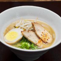 Tonkotsu Shoyu Ramen · Pork and chicken broth and soy sauce soup with ramen noodle. Topping with slice pork , egg, ...