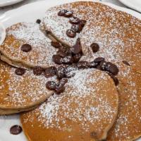 Chocolate Chippies · Chocolate melted into pancakes and then topped with chocolate morsels; accompanied with real...