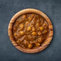 Garbanzo Grande · 16 oz. Boiled chickpea cooked together with spices and herbs and in a thick curry.