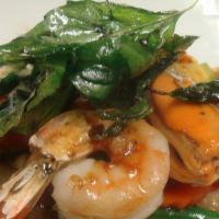*Spicy Thai Basil Seafood · Spicy. Combination seafood stir-fried with fresh chilies, garlic, zucchini, carrots, green b...