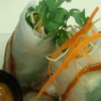Asian Wrap · Fresh spring rolls with tofu, angel hair, and mixed vegetables wrapped in rice paper, served...