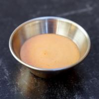 Side Of Sriracha Aioli · Mild-Medium spice level aioli with a splash of lime juice.