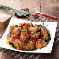 Traditional Spicy Soy Chicken · Marinated traditional fried chicken tossed with spicy soy and garlic.