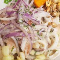 Ceviche · Your choice of marinated raw fish, shrimp, or seafood in lime juice, topped with purple onio...
