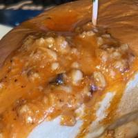 Garlic Fire Chicken Sandwich · Fried chicken smothered in our house-made garlic parmesan buffalo sauce, with ranch or blue ...