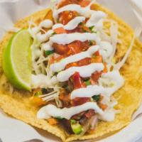 Shrimp Taco · Tasty deep fired shrimp taco, fried tortilla, cilantro, cabbage, pico de gallo, and chipotle...