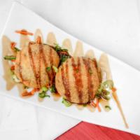 Hot Chilis · Surimi, cream cheese, monterrey jack filled, chile guerro panko fried appetizer topped with ...