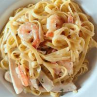 Fettuccine Alfredo · Fettuccine served with light alfredo sauce, Parmesan cheese, with shrimp or chicken or smoke...