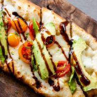 Avocado Caprese · Vegetarian. Mozzarella, cherry tomatoes, avocado, balsamic glaze.