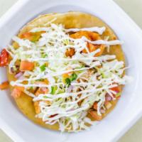 Shrimp Tacos · Two tortillas, lightly battered shrimp, cabbage, pico de gallo, and Sour cream.