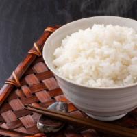 Steamed Rice · A side of Steamed rice, served on the side.