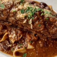 Farmer'S Special · Large beef short rib stewed in an Italian wine sauce. Served with home made pappardelle past...