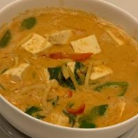 Red Curry · Choice of meat with bamboo shoot, bell pepper and basil in red curry sauce.