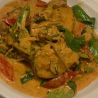 Catfish Supreme · Deep fried bone-in catfish with bell pepper and basil in red curry sauce.