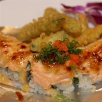 Super Salmon Roll · In: Crab, Shrimp Tempura, Avocado
Out: Baked Salmon, Fried Jalapeno