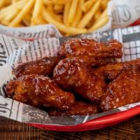12 Wings · Chicken wings with your choice of bbq, buffalo, garlic parmesan, lemon pepper, or traditiona...