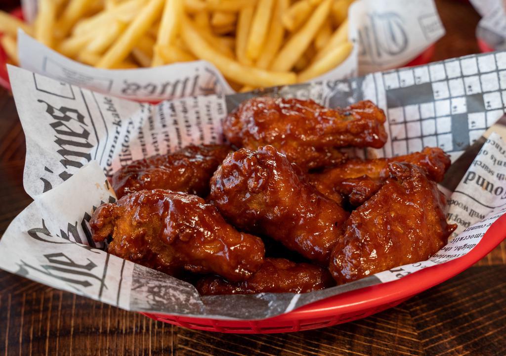 12 Wings · Chicken wings with your choice of bbq, buffalo, garlic parmesan, lemon pepper, or traditional flavor per 6 pieces and ranch, blue cheese, bbq, buffalo, or chipotle ranch dipping sauce per 6 pieces.