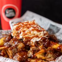 Brisket Fries · Fries Loaded with Brisket Burnt Ends, Carolina Reaper Cheese, Coleslaw, and BBQ Sauce