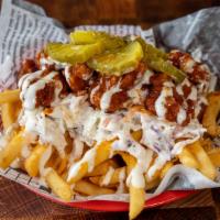 Nashville Hot  Loaded Fries · Fries loaded with fried popcorn chicken tossed in Nashville Hot sauce, shredded cheddar chee...