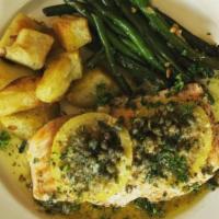 Salmone · Wild caught salmon with fresh lemon, capers and olive oil served with green beans and roaste...