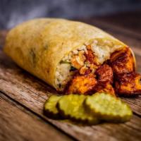 Nashville Hot Chicken Burrito · Crispy chicken, signature Nashville hot sauce, pickles, seasoned white rice rolled in a warm...