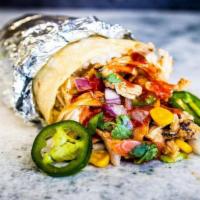 Scorpion Pepper Shredded Chicken Burrito · Calling all heat seekers! This sauce rates at an astounding 50,000 Scoville rating and there...