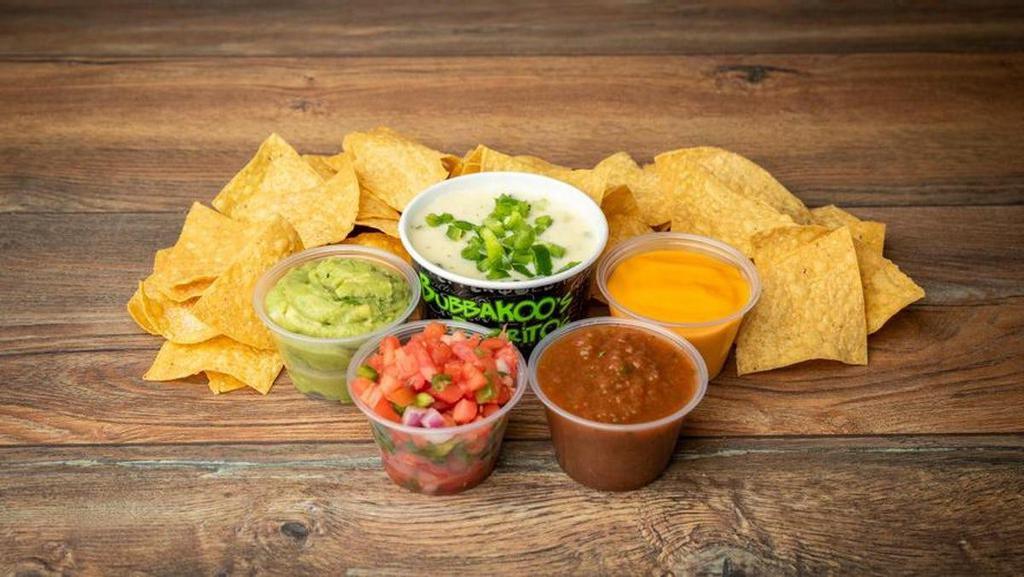 Chips · Fresh, fried-in-house corn tortilla chips served with salsa or upgrade to a dip!