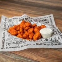 Fried Cauliflower · Fried cauliflower tossed in one of our signature flavors served with a side of ranch dressing.