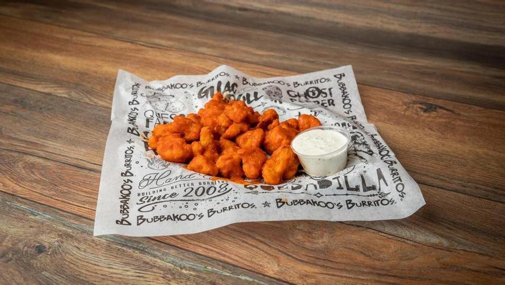 Fried Cauliflower · Fried cauliflower tossed in one of our signature flavors served with a side of ranch dressing.