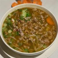 Tom Yum (Lemongrass) · Spicy lemongrass soup with onion, mushroom, tomato, cilantro.