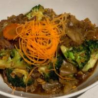 Pad See Ewe · Stir-fried flat noodle with gai LAN, carrot, broccoli, cabbage and egg in homemade sauce.