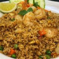 Thai Fried Rice · Curry flavored rice with shrimp, pineapple, eggs, cashews, onion and bell pepper.