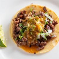 Taco · Soft corn tortillas with your choice of meat (beef, chicken, pork) with onion, cilantro and ...