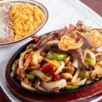 Dos Compadres Fajitas · The best of the best, grilled chicken breast and grilled steak along with grilled shrimp mix...