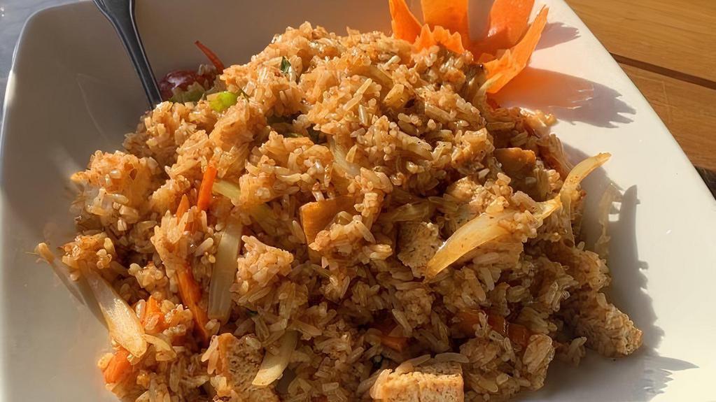 Spicy Fried Rice · Spicy. Basil fried rice. Fried rice with choice of meat, onion, bell peppers and sweet basil in spicy-garlic chili sauce.