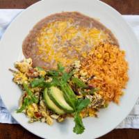 Machaca Plate
 · Shredded beef, onions, tomatoes and pepper all mixed with scrambled eggs. Served with rice a...