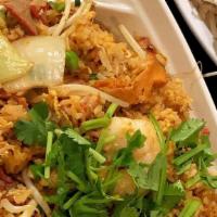 Combination Fried Rice · Vietnamese BBQ Pork, Chicken, & Shrimp fried rice with egg, white onions, bean sprouts, scal...