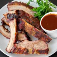 Baby Back Rib Dinner  · Served with slices of bread.
