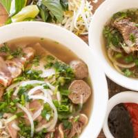 Phở Đặc Biệt · House special Pho- includes all cuts of meat, meatballs, and a side of pork riblet in steami...